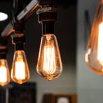 A photograph of a row of lit lightbulbs